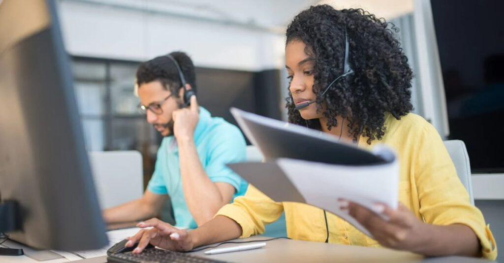 A customer support agent using a call center script