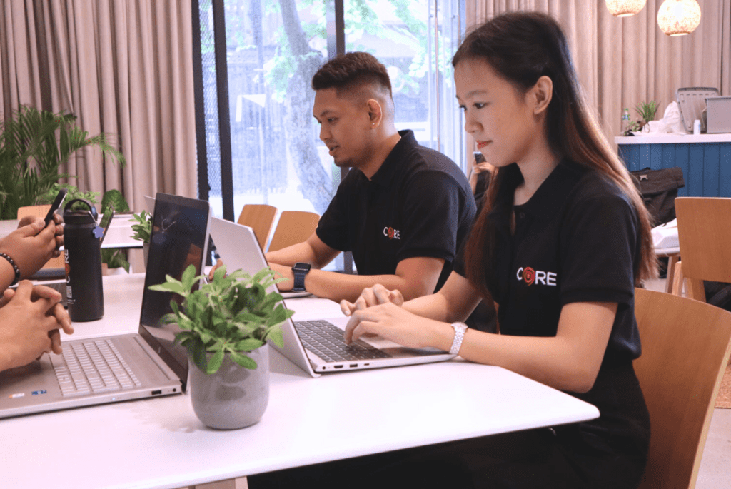 2 employees working on what is recruitment process outsourcing
