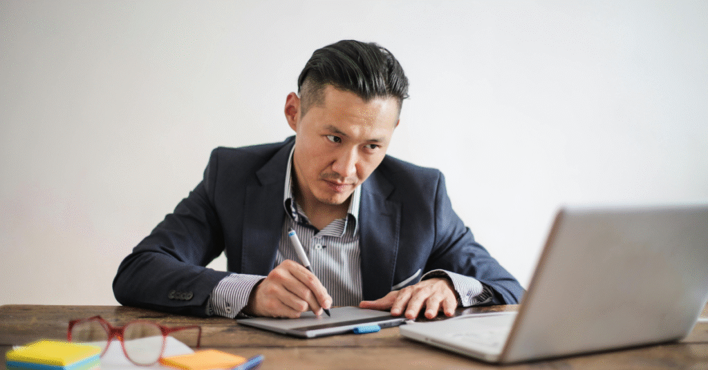 A man working as a real estate executive assistant in the Philippines